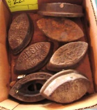 box of antique irons