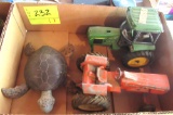 toy turtle, Allis-Chalmers toy tractor, and JD toy tractor