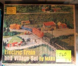 electric train set and village