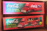 2 Coca Cola toy trucks