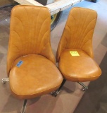 2 armless rolling chairs