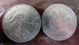 2- 2006 Silver Dollars uncirculated, 1 with mint mark W, 1 with no mint mark