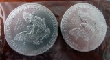 2- 2014 Silver Dollars uncirculated, no mint mark