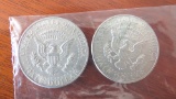 2- 1964 half dollars, mint mark D