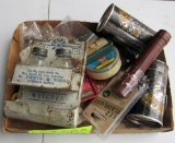old shell beer cans, round baseball cards, salt and pepper shakers, camo tin, flashlight