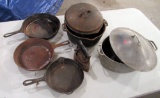 cast iron pot and skillets
