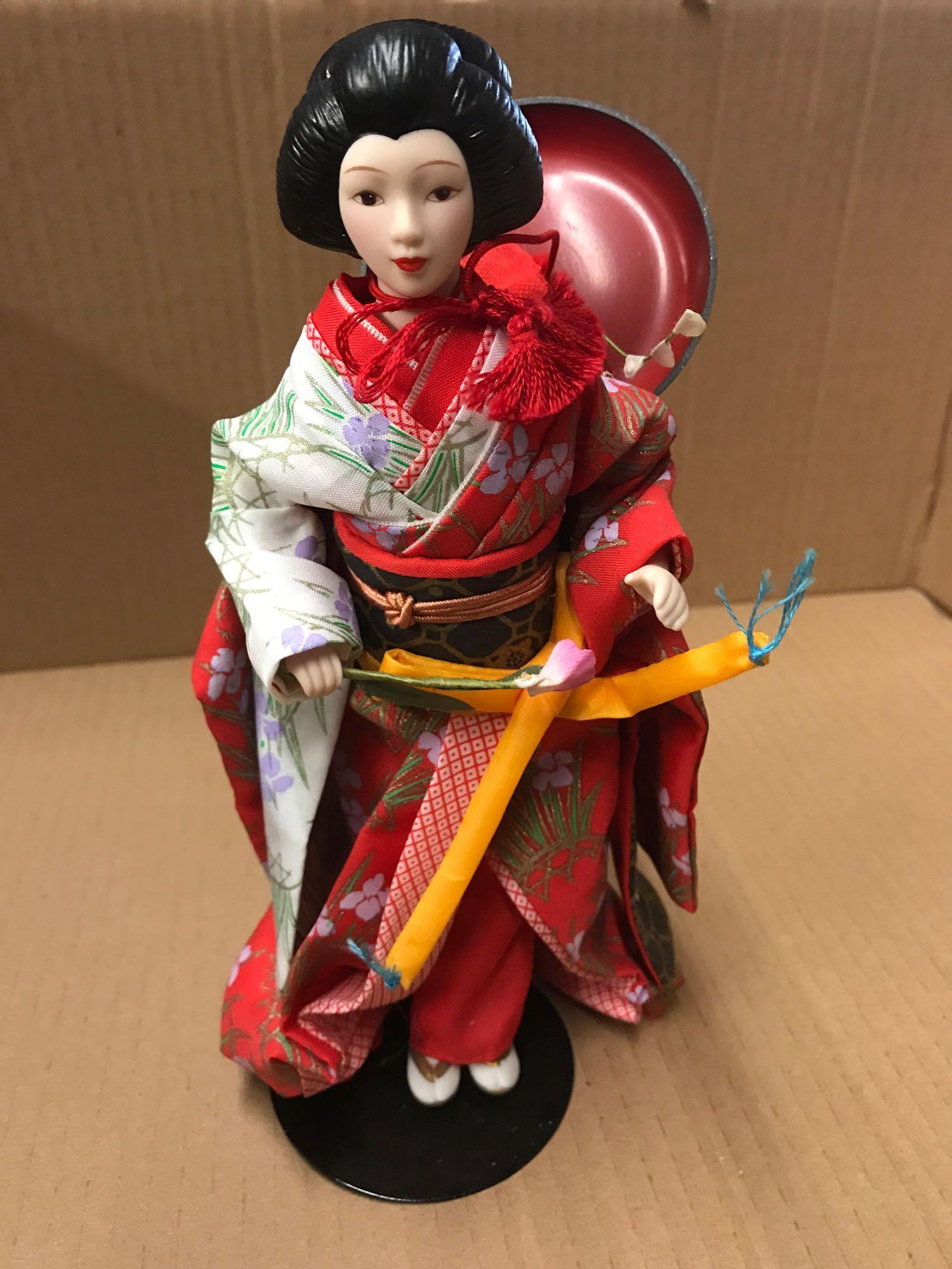 Avon international porcelain doll collection 2025