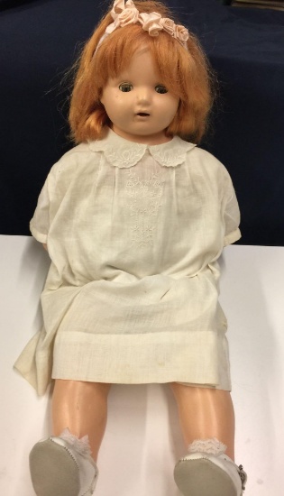 Antique Composition Doll with sleep eyes and teeth