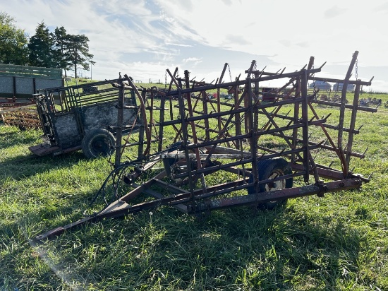 Spiked tooth harrow on cart