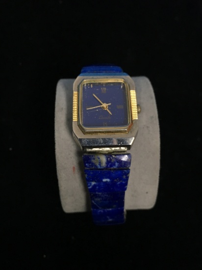 Blue and Gold Tone Women's Wrist Watch With Flexible Band