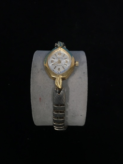 Advance Quartz Gold and Silver Tone Women's Watch with Flexible Band