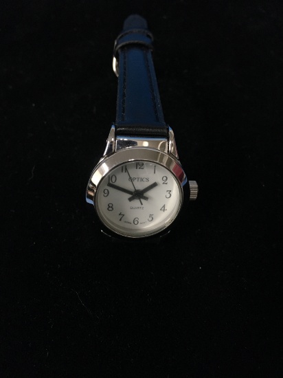 Optics Silver Tone with White Face and Black Leather Band Watch