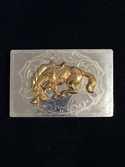 Laying Down Gold Tone Horse on Silver Tone Etched Background Belt Buckle