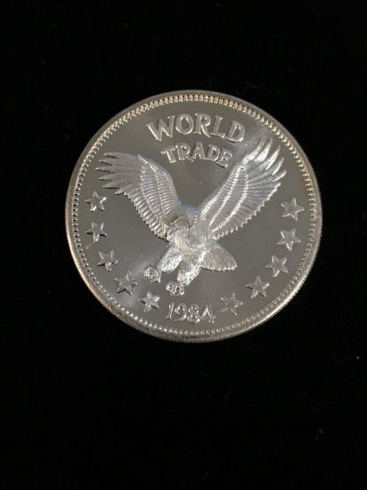 1 Troy Ounce .999 Fine Silver World Trade Unit 1984 Silver Bullion Round Coin