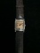 Women's Silver and Brown Tone Emporio Armani Watch with Brown Band