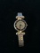 Gitano Black and Gold Tone Women's Watch With Flexible Gold Tone Band