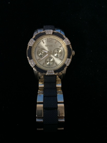 Men's Gruen Black and Gold Tone Watch with Instructions