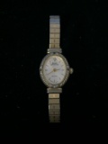 Sarah Coventry Gold and Silver Tone Women's Watch with Flexible Gold Tone Band