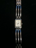 Women's Silver Tone Art Deco Style Screamers Brand Watch with Wings