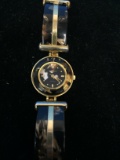 LA Express Gold and Black Tone Women's Watch with Designed Cuff Style Wings