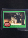 1977 Topps Star Wars Series 4 Card #228 R2-D2 is Inspected by the Jawas
