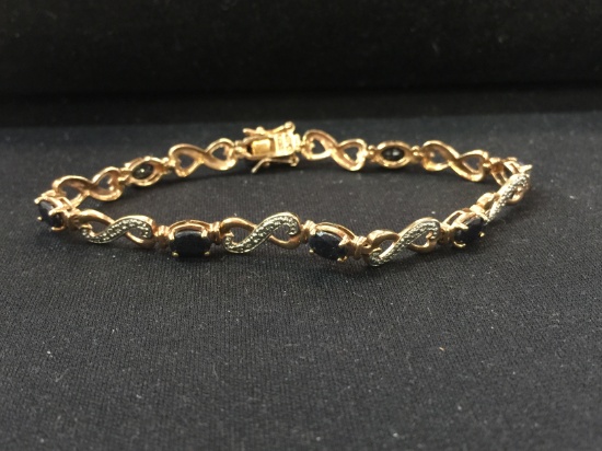 Gold Tone Sterling Silver "S" Link Tennis Bracelet 7.25" w/ 8 Oval Midnighr Sapphires