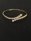 Gold-Tone Spring Bypass Sterling Silver Bangle Bracelet Adorned w/ Graduating Rhinestones