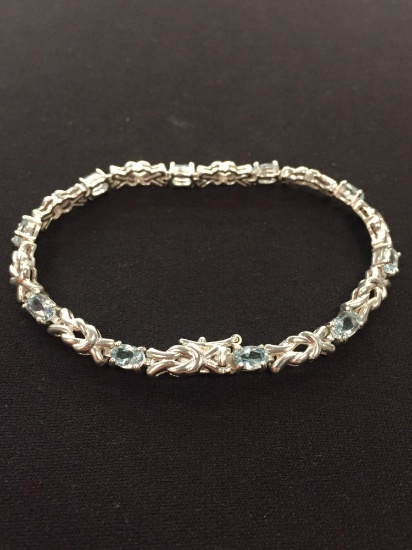 Thai Made Sterling Silver Blue Topaz 8" Tennis Bracelet