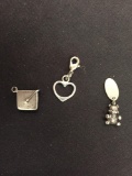 Three Sterling Silver Pendants