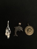 Three Sterling Silver Pendants