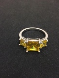 Graduating Princess Cut Yellow Sapphire Sterling Silver Three-Stone Ring Band - Size 7