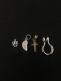 Lot of Four Various Styled Small Sterling Silver Pendants