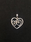Twin Round Faceted Illusion Set Diamond Accented Sterling Silver Heart Pendant