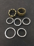 Lot of Seven Silver & Brass Tone Rustic Various Sized Ring Bands