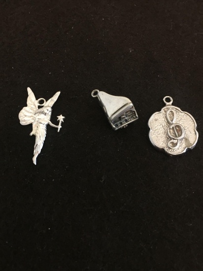 Lot of Three Various Styled Sterling Silver Charms