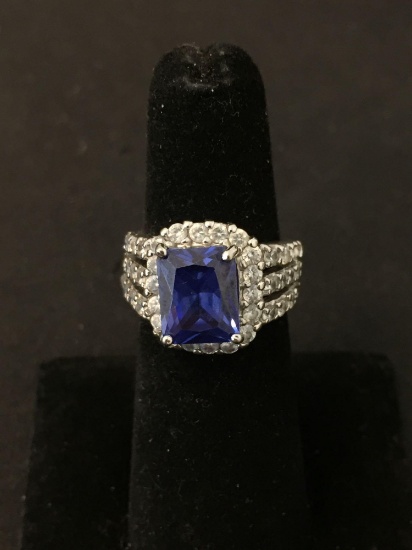 CFJ Designed Radiant Faceted 10x8mm Tanzanite w/ Zircon Halo & Triple Split Shank Sterling Silver