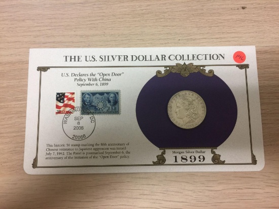 1899-O United States Morgan Silver Dollar on Display Card with Stamps