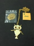 Lot of Two Gold-Tone Alloy Art Designed Jewelry Items, One 28
