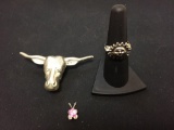 Lot of Three Various Styled Silver-Tone Items, One Bull Motif Bolo Tie, One Pink Zircon Pendant &