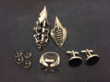 Lot of Four Silver-Tone Alloy Items, Two Large Tribal Motif Ring Bands, One Cross Ring Band &