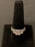 Cushion Faceted 7x5mm Zircon Center w/ Two Cushion Sides & Channel Set Baguette Shoulders Sterling