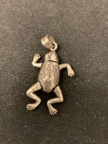Engraved Dancing Leap Frog Design 1.25