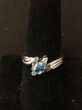 Diagonally Set Oval Faceted 5.5x4mm Blue Topaz w/ Round White Accents Sterling Silver Ring Band-Size