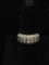 UTC Designed Seven Vertical Rows of Four Round Faceted Channel Set Zircon 9mm Wide 14kt Gold Ring