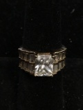 Cushion Faceted 9x7mm Zircon Center w/ Twin Rows of Channel Set Zircon Baguettes Gold-Tone Sterling