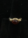 Horizontal Bezel Set 10x8mm Amber Cabochon Engraved Far East Style Gold-Tone Sterling Silver Ring