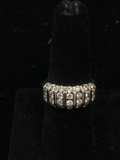 UTC Designed Seven Vertical Rows of Four Round Faceted Channel Set Zircon 9mm Wide 14kt Gold Ring