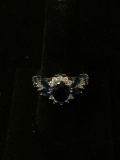 Oval Faceted 9x7mm Created Blue Sapphire Center w/ White Zircon Halo & Marquise Sapphire Sides