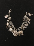 Elongated Curb Link 7in Long Sterling Silver Bracelet w/ Many Various Charms - 37 Grams