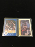 2 Card Lot of Isiah Thomas Rookie Cards - 1986 Star & 1986-87 Fleer Sticker from Collection